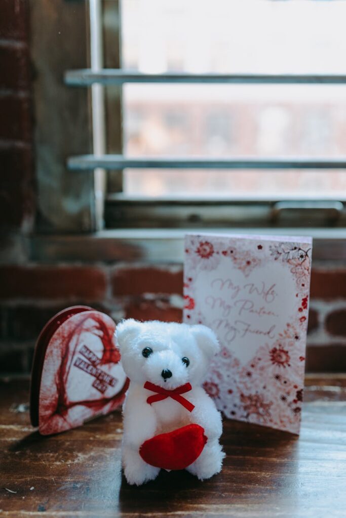 Delightful Valentine's gift set with a teddy bear, chocolate box, and card, perfect for loved ones.